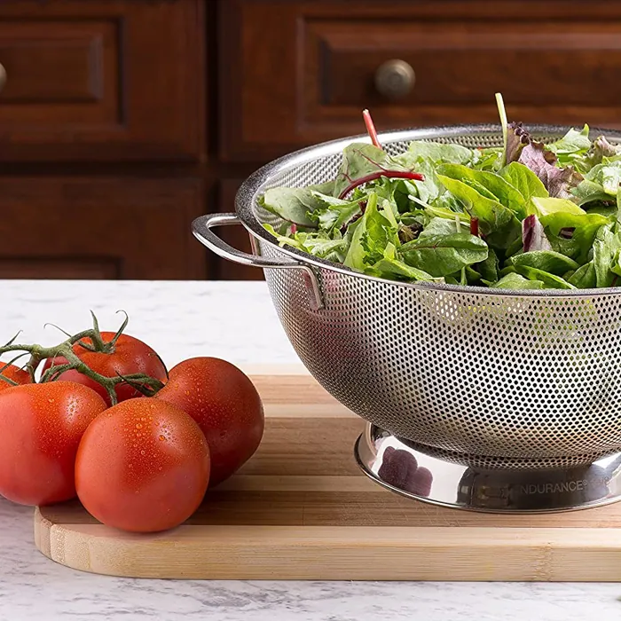 A colander full of greens: the piece the range started with.