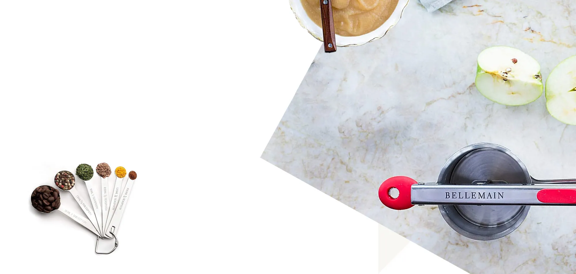 Measuring spoons and a press on marble, the way we photograph a tool before it gets a page.