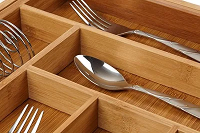 Bamboo Kitchen Drawer Organizer, Expandable 8-Slot Tray, photographed on a counter.
